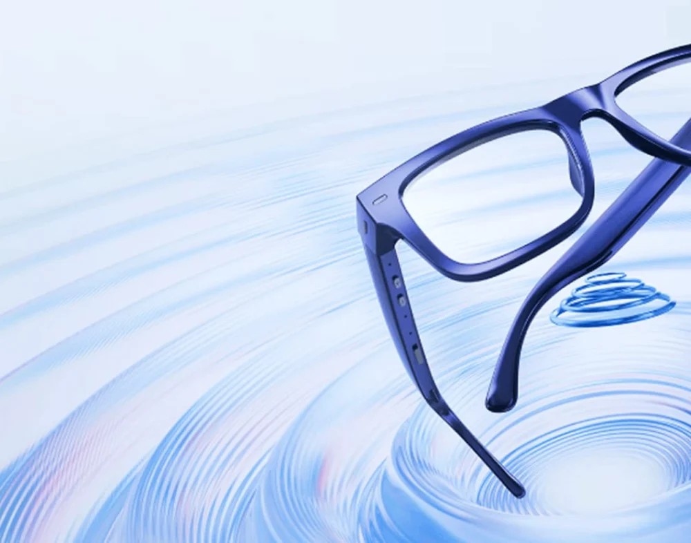 Nuance Audio hearing glasses over rippling water